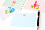 Stationery Box Set (55 Pcs) Including Writing Paper Envelopes Postcards Sticky Note Pad Pen and Stickers Featuring Cat Dog Flamingo Llama Sloth and Peacock Stationary 